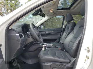 2023 Mazda CX-5 2.5 S Premium Package with VIN JM3KFBDM4P0217729, listed as a Copart auction lot 85883354 with 18,116 mi miles and Salvage Title. Bid and sale history available at carsss.com. Image 7.