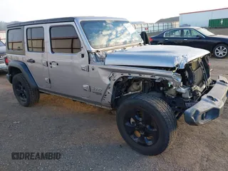 2018 Jeep Wrangler Unlimited Sport S z VIN 1C4HJXDG1JW183052, wystawiony jako IAAI lot #41372557 z przebiegiem 56 076 mil mil oraz . Historia ofert i sprzedaży dostępna na DreamBid. Obrazek 1.