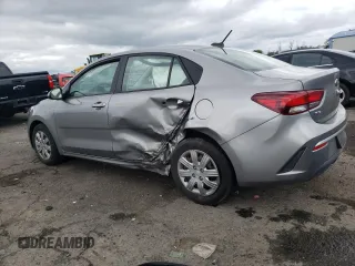 2021 Kia Rio S with VIN 3KPA24AD2ME401151, listed as a Copart auction lot 63223013 with 42,779 mi miles and Salvage Title. Bid and sale history available at DreamBid. Image 2.