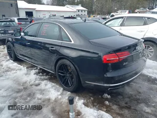 2015 Audi A8 L 4.0T with VIN WAU32AFD2FN033629, listed as a IAAI auction lot 41448956 with 120,364 mi miles. Bid and sale history available at carsss.com. Image 3.