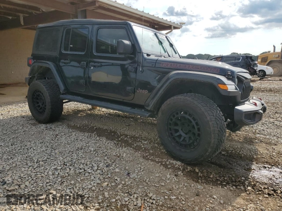 2019 Jeep Wrangler Unlimited Rubicon with VIN 1C4HJXFN2KW525606, listed as a Copart auction lot 62674225 with 55,128 mi miles and Salvage title. Bid and sale history available at DreamBid. Image 4.