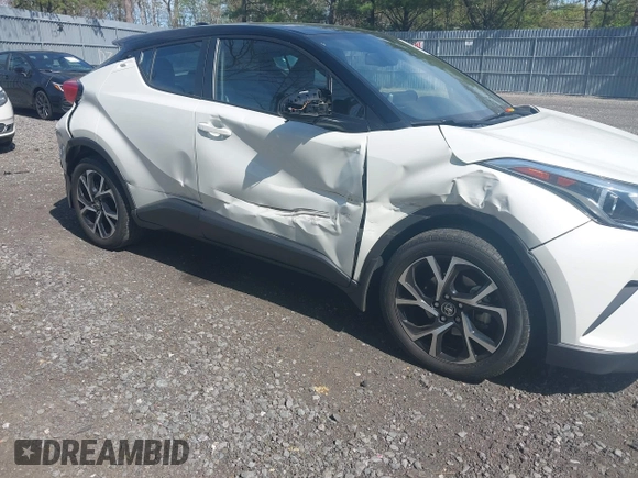 2019 Toyota C-HR XLE with VIN NMTKHMBX5KR097682, listed as a IAAI auction lot 42145372 with 11,003 mi miles and . Bid and sale history available at DreamBid. Image 6.