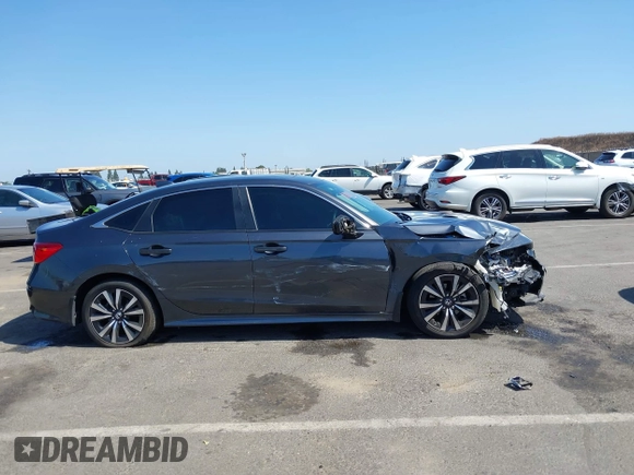 2023 Honda Civic EX with VIN 2HGFE1F74PH323979, listed as a IAAI auction lot 42499373 with 70,326 mi miles and . Bid and sale history available at DreamBid. Image 13.
