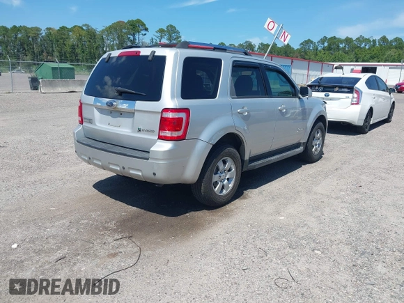 2009 Ford Escape Hybrid z VIN 1FMCU593X9KA59775, wystawiony jako IAAI lot #42763464 z przebiegiem 142 396 mil mil oraz . Historia ofert i sprzedaży dostępna na DreamBid. Obrazek 4.