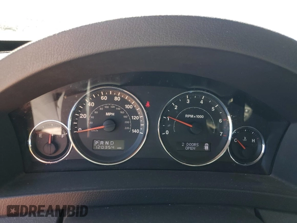 2010 Jeep Grand Cherokee Laredo with VIN 1J4PR4GK9AC104970, listed as a Copart auction lot 72173034 with 120,354 mi miles and Salvage Title. Bid and sale history available at carsss.com. Image 9.