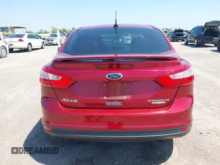 2013 Ford Focus Titanium with VIN 1FADP3J23DL334161, listed as a IAAI auction lot 41987758 with 117,665 mi miles and . Bid and sale history available at carsss.com. Image 16.