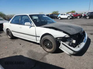 1992 Acura Integra with VIN JH4DB1649NS000455, listed as a Copart auction lot 62386755 with 209,785 mi miles and Salvage title. Bid and sale history available at DreamBid. Image 4.