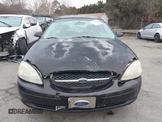 2000 Ford Taurus SE with VIN 1FAFP53U9YA252519, listed as a IAAI auction lot 41247046 with 317,910 mi miles and . Bid and sale history available at DreamBid. Image 11.