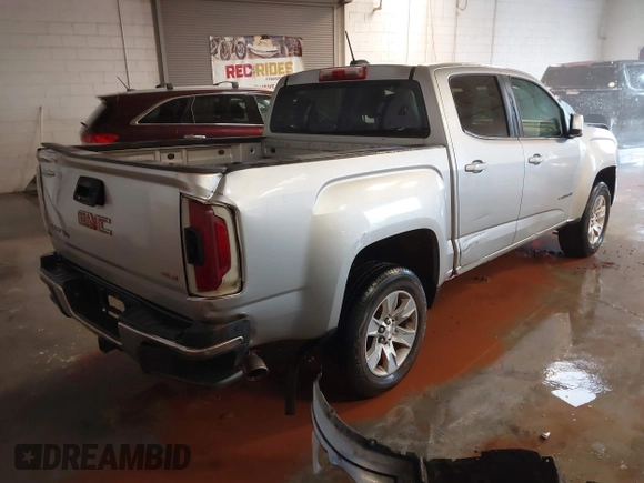 2015 GMC Canyon 2WD SLE with VIN 1GTG5BE36F1237805, listed as a IAAI auction lot 41399321 with 155,288 mi miles. Bid and sale history available at carsss.com. Image 4.