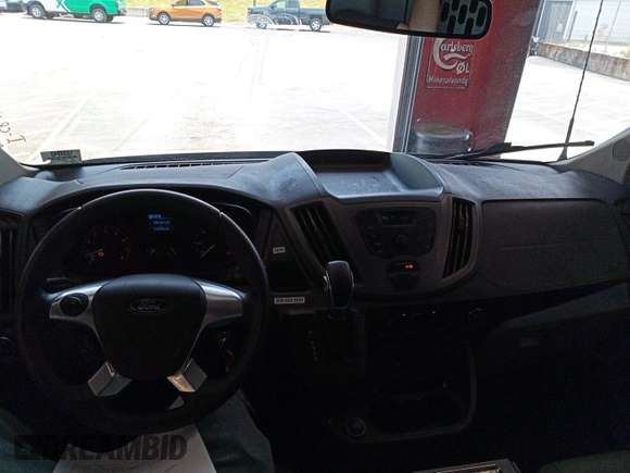 2018 Ford Transit z VIN 1FTYE1CM6JKB35871, wystawiony jako IAAI lot #42737736 z przebiegiem 199 396 mil mil oraz . Historia ofert i sprzedaży dostępna na DreamBid. Obrazek 4.