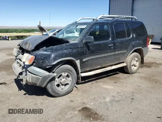2001 Nissan Xterra XE with VIN 5N1ED28T01C522269, listed as a Copart auction lot 56997515 with 103,800 mi miles and Salvage title. Bid and sale history available at DreamBid. Image 1.