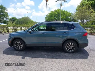 2019 Volkswagen Tiguan SE with VIN 3VV3B7AX8KM171057, listed as a IAAI auction lot 42209509 with 99,437 mi miles and . Bid and sale history available at DreamBid. Image 14.