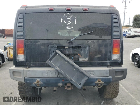 2003 Hummer H2 with VIN 5GRGN23UX3H101416, listed as a Copart auction lot 84423354 with 113,699 mi miles and Clean Title. Bid and sale history available at carsss.com. Image 6.