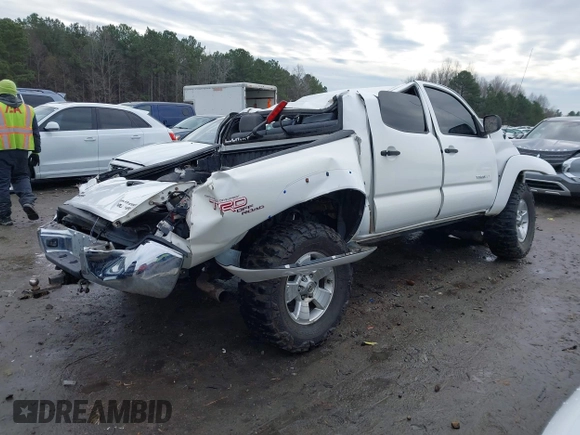2009 Toyota Tacoma PreRunner with VIN 3TMJU62N59M082788, listed as a IAAI auction lot 41297385 with 253,581 mi miles. Bid and sale history available at carsss.com. Image 4.