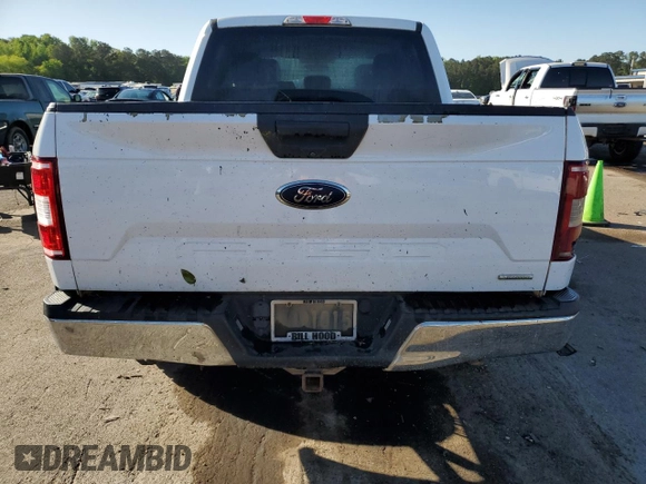 2018 Ford F-150 XL with VIN 1FTEW1EP0JKD00126, listed as a Copart auction lot 52626585 with 303,395 mi miles and Clean title. Bid and sale history available at DreamBid. Image 6.