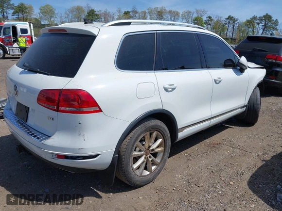 2013 Volkswagen Touareg Sport с VIN WVGEP9BP4DD013215, выставлен на аукционе IAAI как лот 42154801 с пробегом 159 556 миль миль и . История ставок и продаж доступна на DreamBid. Изображение 4.
