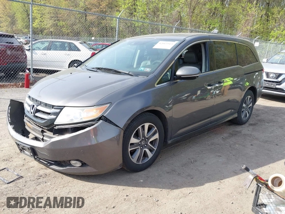 2014 Honda Odyssey Touring with VIN 5FNRL5H92EB073085, listed as a IAAI auction lot 42065913 with 120,834 mi miles and . Bid and sale history available at DreamBid. Image 17.