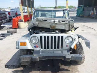 2006 Jeep Wrangler X with VIN 1J4FA39S36P703941, listed as a IAAI auction lot 42220361 with 148,829 mi miles and . Bid and sale history available at DreamBid. Image 12.