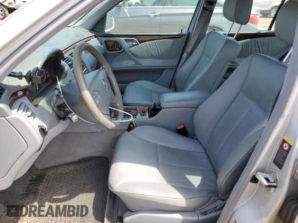 2002 Mercedes-Benz E-Class with VIN WDBJF82J92X065591, listed as a Copart auction lot 65841964 with 155,195 mi miles and Salvage Title. Bid and sale history available at carsss.com. Image 7.