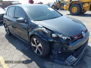 2012 Volkswagen Golf GTI w/Sunroof & Navi PZEV with VIN WVWHD7AJ6CW212278, listed as a IAAI auction lot 42521840 with 119,592 mi miles and . Bid and sale history available at DreamBid. Image 1.