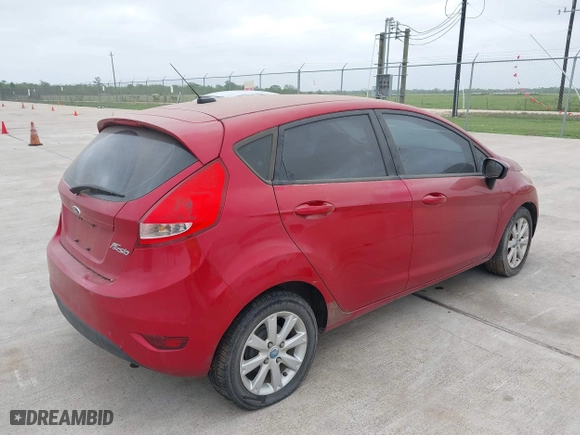 2012 Ford Fiesta SE with VIN 3FADP4EJ3CM115141, listed as a IAAI auction lot 41967221 with 1 mi miles. Bid and sale history available at carsss.com. Image 4.