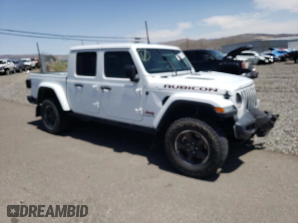 2022 Jeep Gladiator Rubicon z VIN 1C6JJTBG4NL135430, wystawiony jako Copart lot #52581015 z przebiegiem 54 553 mil mil oraz Szkoda całkowita • Salvage title. Historia ofert i sprzedaży dostępna na DreamBid. Obrazek 4.