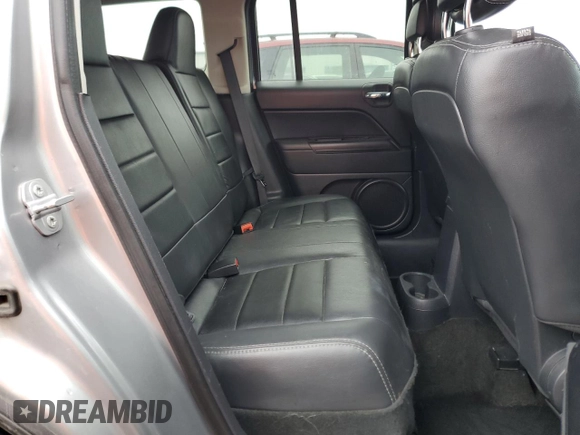 2015 Jeep Patriot High Altitude with VIN 1C4NJRFB2FD396806, listed as a Copart auction lot 57651155 with 130,357 mi miles and Salvage title. Bid and sale history available at DreamBid. Image 11.