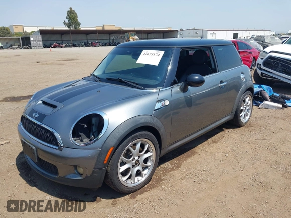 2010 MINI Hardtop S with VIN WMWMF7C53ATZ70244, listed as a IAAI auction lot 42673174 with 137,805 mi miles and . Bid and sale history available at DreamBid. Image 2.