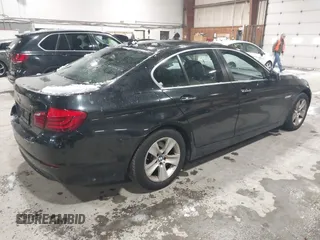 2013 BMW 5 Series 528i xDrive with VIN WBAXH5C57DD109045, listed as a IAAI auction lot 41525875 with 121,549 mi miles. Bid and sale history available at carsss.com. Image 4.