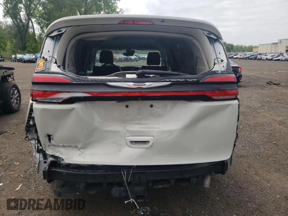 2021 Chrysler Pacifica Touring L with VIN 2C4RC1BGXMR559226, listed as a Copart auction lot 59515235 with 61,219 mi miles and Salvage title. Bid and sale history available at DreamBid. Image 6.