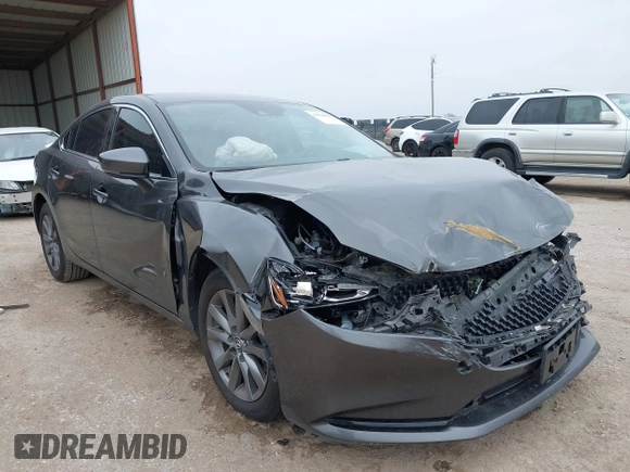 2020 Mazda 6 Sport with VIN JM1GL1UM3L1523858, listed as a IAAI auction lot 41506321 with 49,102 mi miles and . Bid and sale history available at DreamBid. Image 1.