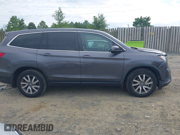 2019 Honda Pilot EX-L with VIN 5FNYF5H45KB018293, listed as a IAAI auction lot 42318481 with 76,617 mi miles and . Bid and sale history available at DreamBid. Image 13.