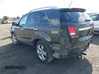 2013 Kia Sorento EX with VIN 5XYKUDA24DG331006, listed as a IAAI auction lot 41998319 with 143,141 mi miles. Bid and sale history available at carsss.com. Image 3.
