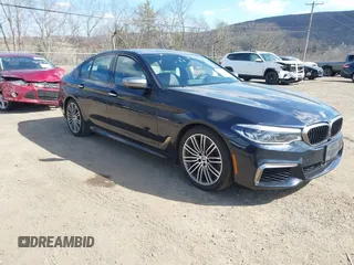 2018 BMW 5 Series M550i xDrive with VIN WBAJB9C52JB035930, listed as a IAAI auction lot 41674415 with 56,294 mi miles. Bid and sale history available at carsss.com. Image 1.