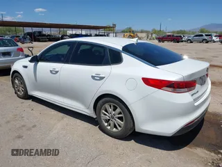 2016 Kia Optima LX with VIN KNAGT4L30G5117719, listed as a IAAI auction lot 42449051 with 122,597 mi miles and . Bid and sale history available at DreamBid. Image 3.