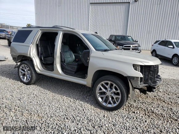 2015 Chevrolet Tahoe LT with VIN 1GNSKBKC6FR162216, listed as a Copart auction lot 48340265 with 125,851 mi miles and Salvage Title. Bid and sale history available at carsss.com. Image 4.