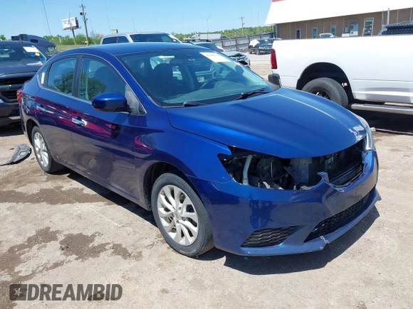 2018 Nissan Sentra SV z VIN 3N1AB7APXJY266879, wystawiony jako IAAI lot #42106571 z przebiegiem 140 050 mil mil oraz . Historia ofert i sprzedaży dostępna na DreamBid. Obrazek 1.