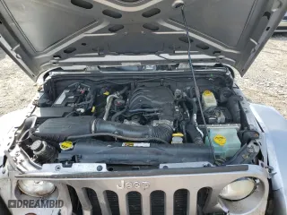 2013 Jeep Wrangler Unlimited Sport with VIN 1C4BJWDG1DL601972, listed as a Copart auction lot 65069824 with 166,274 mi miles and Salvage Title. Bid and sale history available at carsss.com. Image 11.