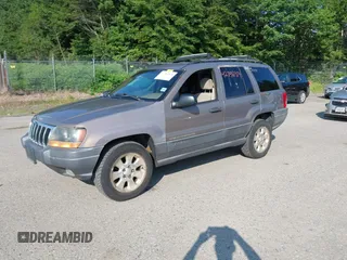 2001 Jeep Grand Cherokee Laredo with VIN 1J4GW48S31C626727, listed as a IAAI auction lot 42796974 with 132,988 mi miles and . Bid and sale history available at DreamBid. Image 2.