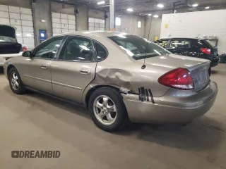 2005 Ford Taurus SE with VIN 1FAFP53U15A276082, listed as a Copart auction lot 52015285 with 103,479 mi miles and Salvage Title. Bid and sale history available at carsss.com. Image 2.