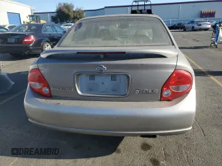 2001 Nissan Maxima SE 20th Anniversary. z VIN JN1CA31A91T314977, wystawiony jako Copart lot #75260034 z przebiegiem 178 471 mil mil oraz Szkoda całkowita • Salvage title. Historia ofert i sprzedaży dostępna na DreamBid. Obrazek 6.