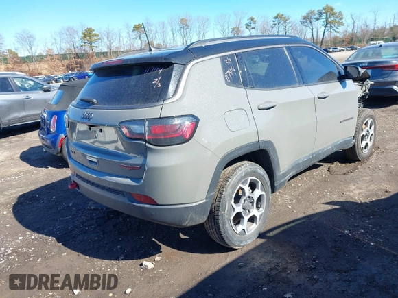 2022 Jeep Compass Trailhawk with VIN 3C4NJDDB4NT136213, listed as a IAAI auction lot 41689612 with 50,091 mi miles and . Bid and sale history available at DreamBid. Image 4.