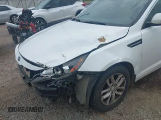2013 Kia Optima LX z VIN KNAGM4A79D5304780, wystawiony jako IAAI lot #42277179 z przebiegiem 139 841 mil mil oraz . Historia ofert i sprzedaży dostępna na DreamBid. Obrazek 14.