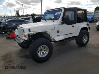 1999 Jeep Wrangler Sahara with VIN 1J4FY49SXXP414414, listed as a Copart auction lot 41643665 with 154,810 mi miles and Salvage Title. Bid and sale history available at carsss.com. Image 1.
