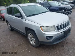 2011 Jeep Compass Latitude with VIN 1J4NF1FB5BD244624, listed as a IAAI auction lot 42093972 with 198,431 mi miles. Bid and sale history available at carsss.com. Image 1.