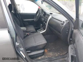 2007 Suzuki Grand Vitara with VIN JS3TE941474203094, listed as a IAAI auction lot 42092310 with 176,903 mi miles. Bid and sale history available at carsss.com. Image 5.