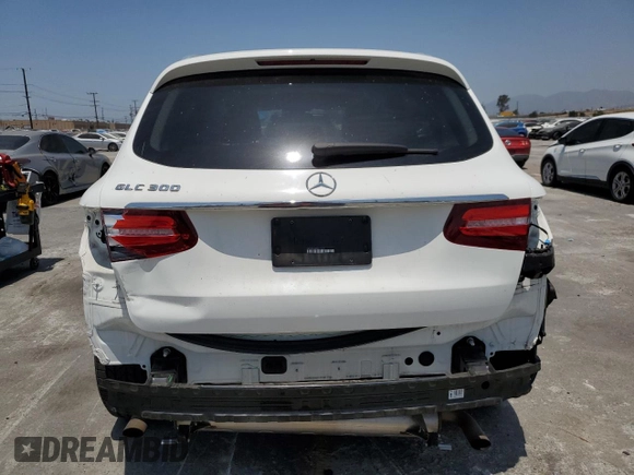 2019 Mercedes-Benz GLC 300 with VIN WDC0G4JB5KF614670, listed as a Copart auction lot 62017055 with 56,575 mi miles and Salvage title. Bid and sale history available at DreamBid. Image 6.