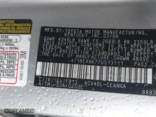 2007 Toyota Camry CE with VIN 4T1BE46K77U513111, listed as a IAAI auction lot 41561545 with 310,776 mi miles. Bid and sale history available at carsss.com. Image 9.