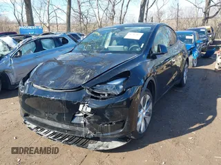 2024 Tesla Model Y with VIN 7SAYGDED5RF093018, listed as a IAAI auction lot 41747467 with 60,469 mi miles and . Bid and sale history available at DreamBid. Image 17.
