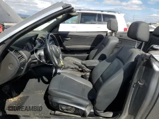 2009 BMW 1 Series 128i with VIN WBAUL73509VJ76763, listed as a Copart auction lot 66763214 with 83,954 mi miles and Salvage Title. Bid and sale history available at DreamBid. Image 7.